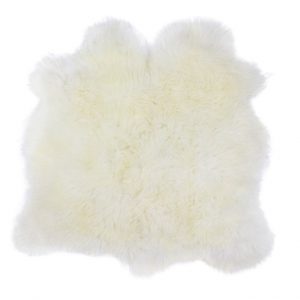 Image of double sheep skin rug on a white floor