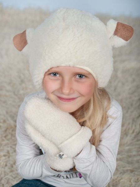 Image of a baby wearing a skeepskin hat