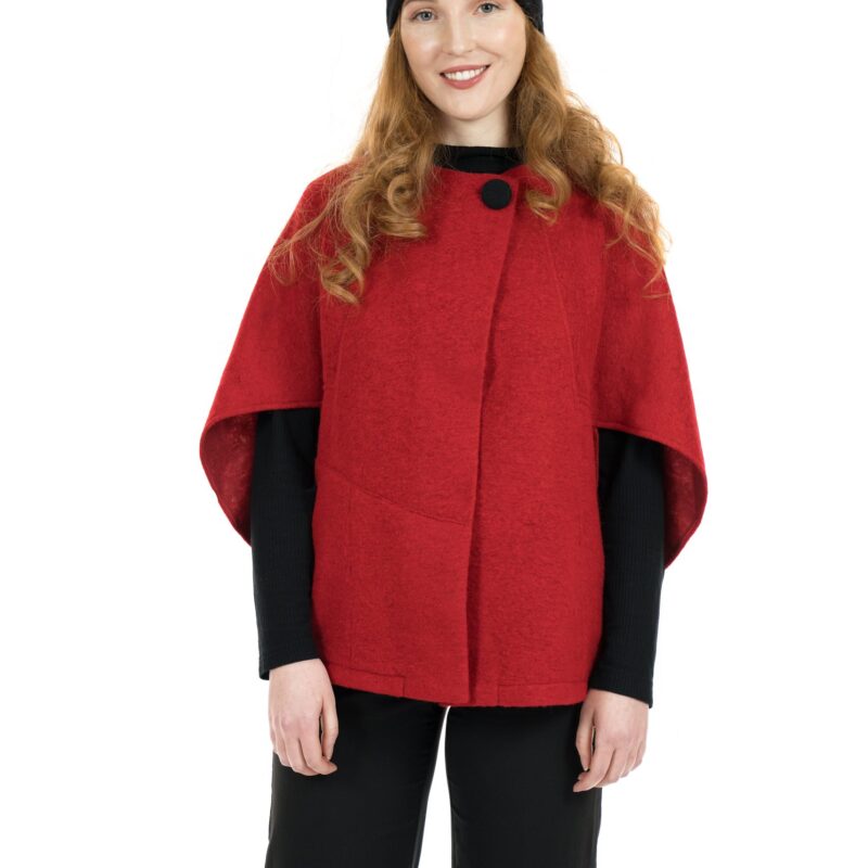 Image of woman wearing a Red short Poncho