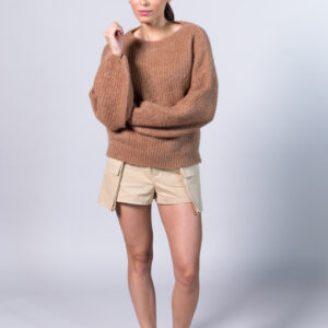 Woman wearing knitted jumer