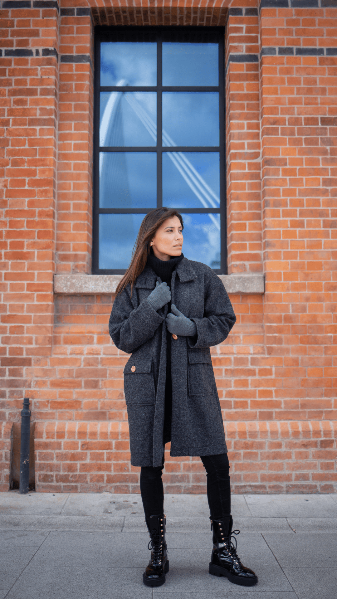 Woman wearing Yoko Wool gray jacket image