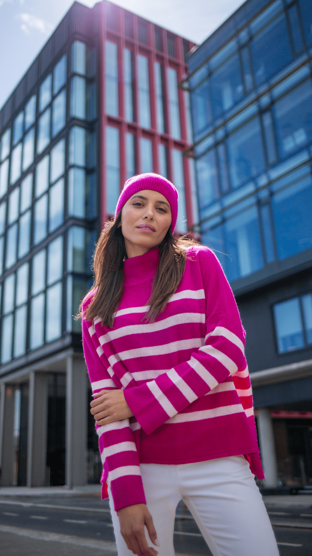 Woman wearing Yoko Wool pink knitwear with stripers image