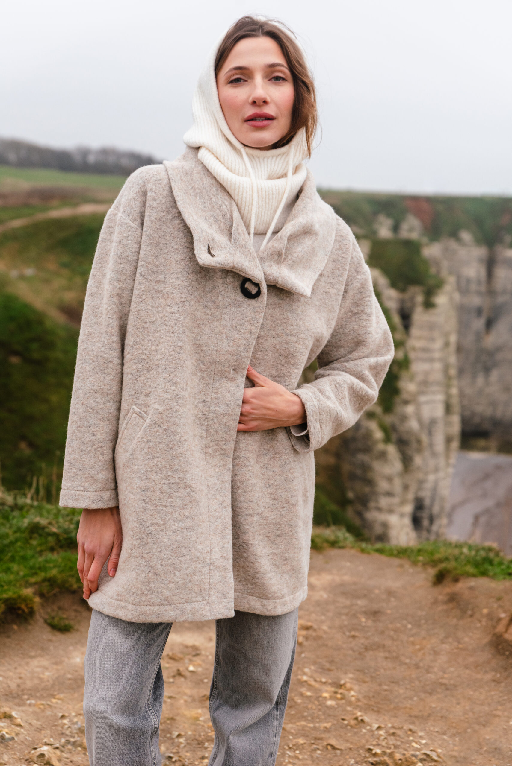 Image of a woman wearing a good mood poncho
