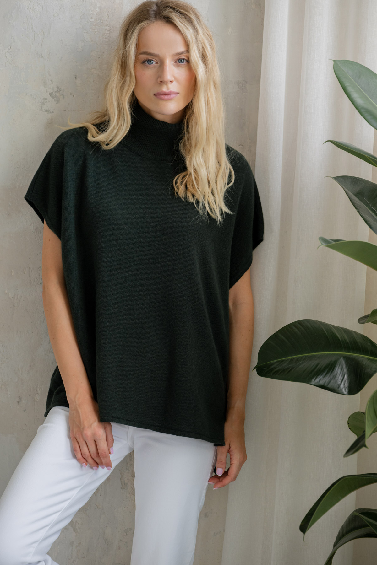 Image of a turtle neck short sweater