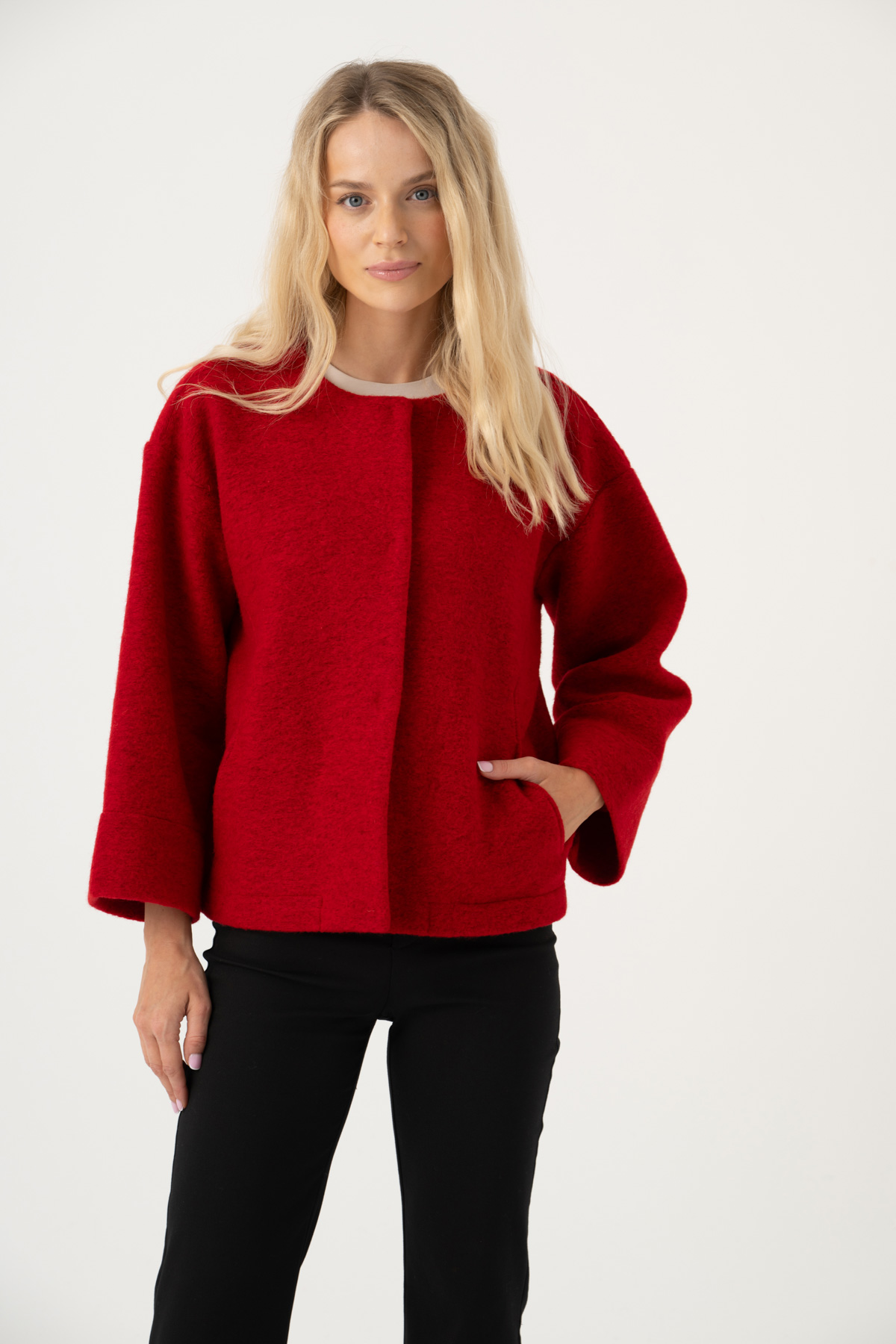 Image of a woman wearing a classic poncho